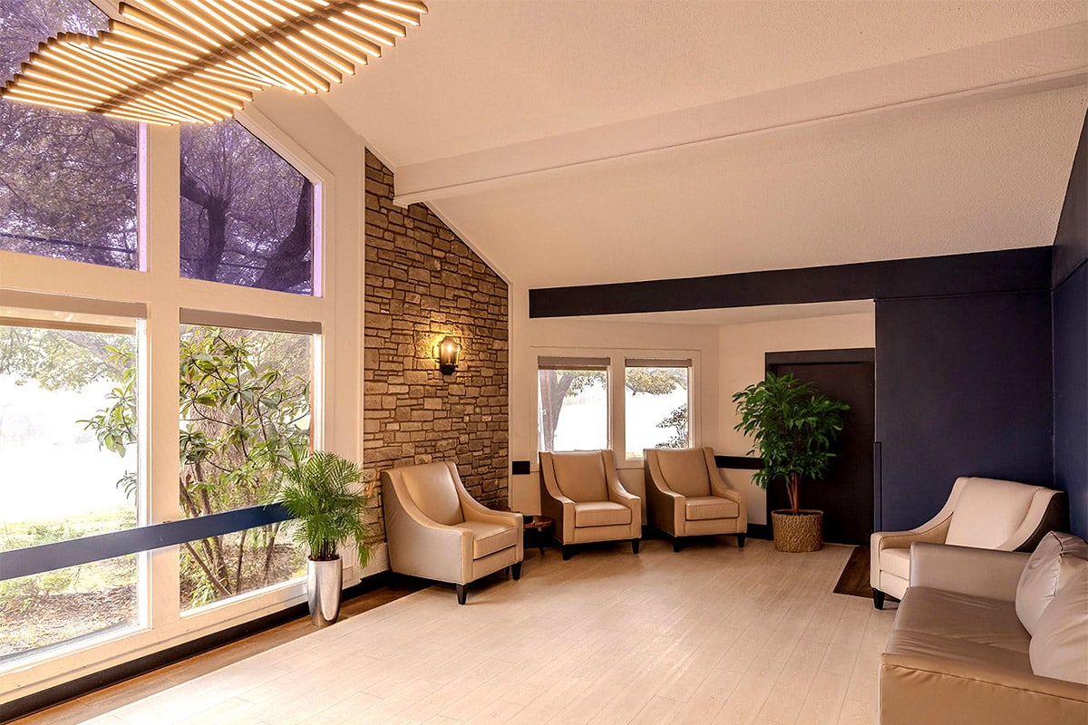Lobby with chairs and couch at Castle Hills Rehab & Care Center